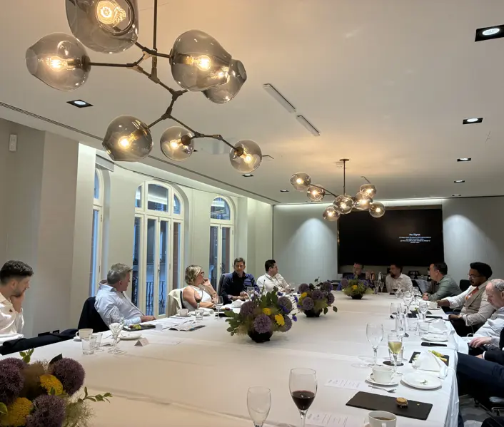 Attendees seated around a dining table at the Inflexion CIO dinner, London
