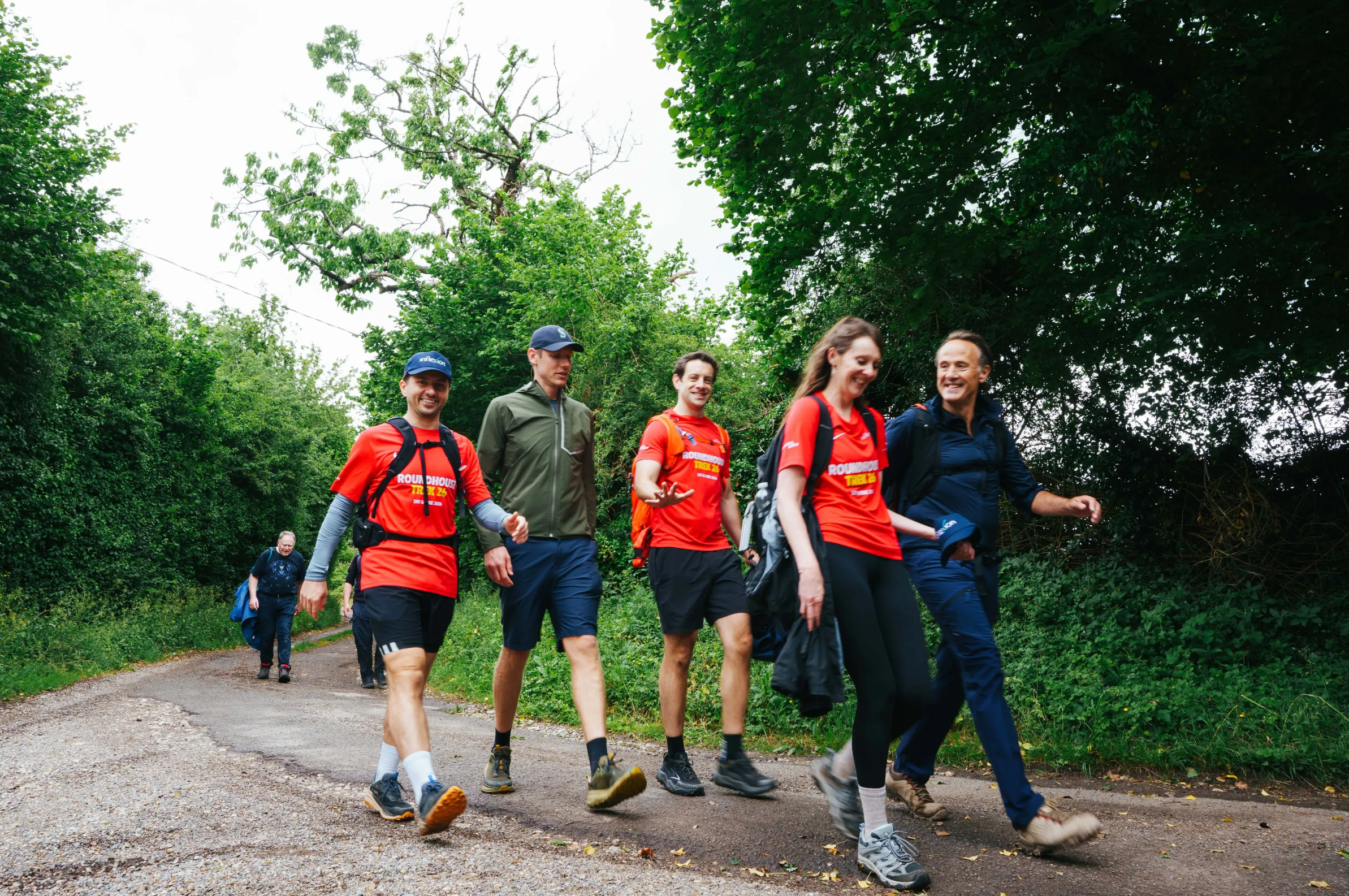 Group of Inflexion staff walking through the wilderness
